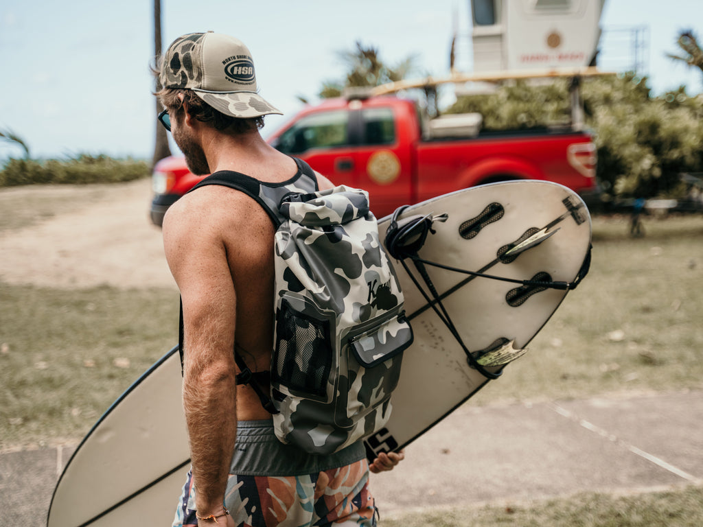 Quintessential Surf Companion: Kauai Surf Co. Waterproof Backpack Adds Flair to Haena Beach Adventure